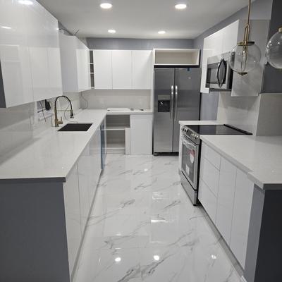 White quartz countertops in a remodeled kitchen