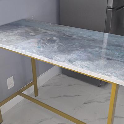 Marble-look epoxy table surface